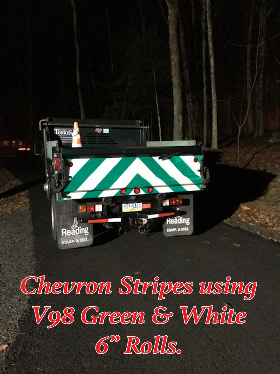 green white reflective panel dump truck